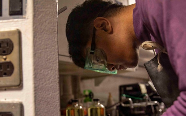 Aviation Boatswain's Mates conduct fuel testing onboard USS Makin Island