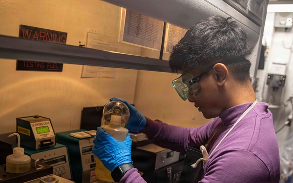 Aviation Boatswain's Mates conduct fuel testing onboard USS Makin Island