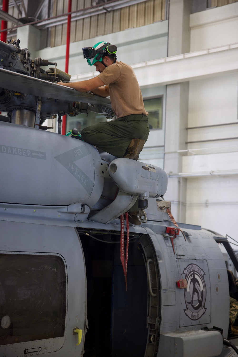 HSM-37 Sailors conduct helo maintenance