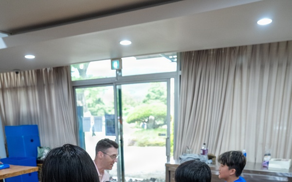 Commander, U.S. Naval Forces Korea Sailors teach English at Hongbeopsa Temple English Camp in South Korea
