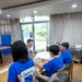 Commander, U.S. Naval Forces Korea Sailors teach English at Hongbeopsa Temple English Camp in South Korea