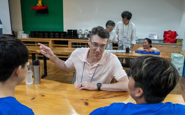 Commander, U.S. Naval Forces Korea Sailors teach English at Hongbeopsa Temple English Camp in South Korea