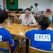 Commander, U.S. Naval Forces Korea Sailors teach English at Hongbeopsa Temple English Camp in South Korea