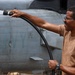 John Finn Washes a Helicopter