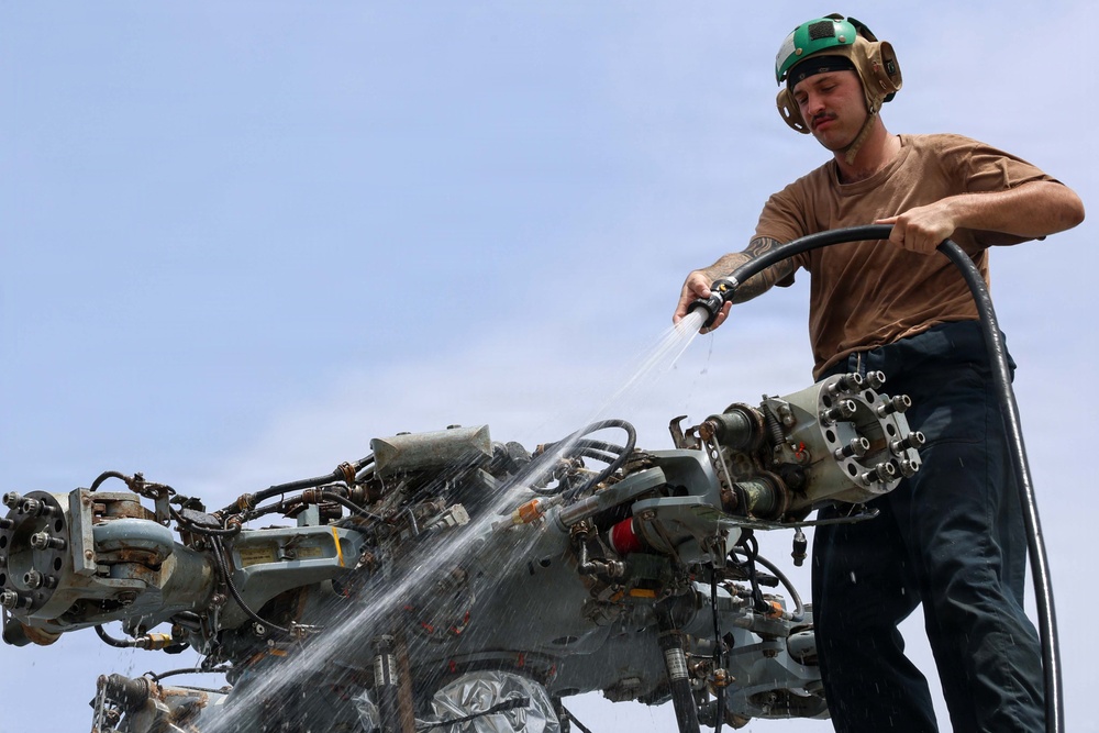 John Finn Washes a Helicopter