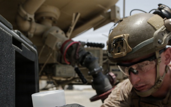 Marines utilize a Petroleum Expeditionary Analysis Kit
