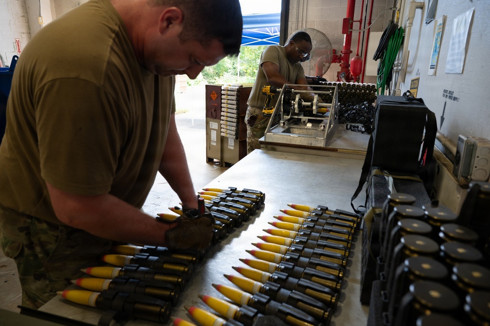 Photo of Airmen with the 116th Munitions Flight