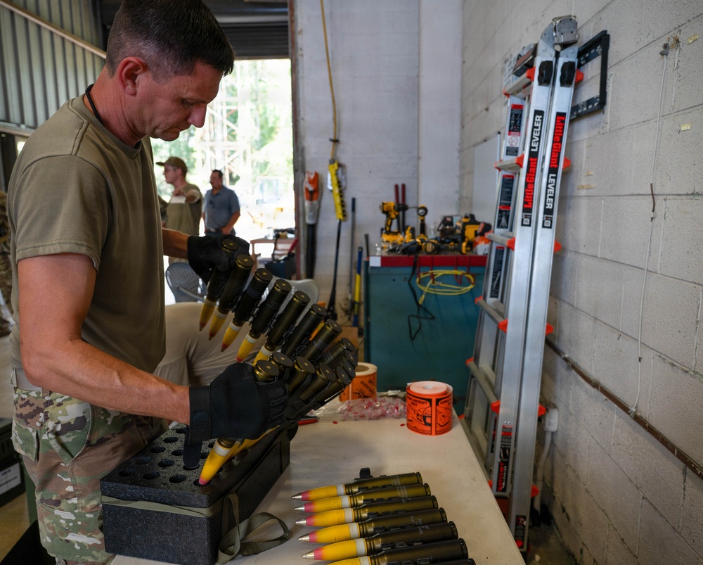 Photo of Airmen with the 116th Munitions Flight