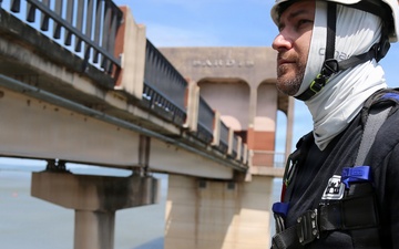 Inspecting Sardis Lake's service bridge