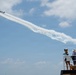 The Titan Aerobatic Team flies by the U.S. Coast Guard Cutter Barbara Mabrity