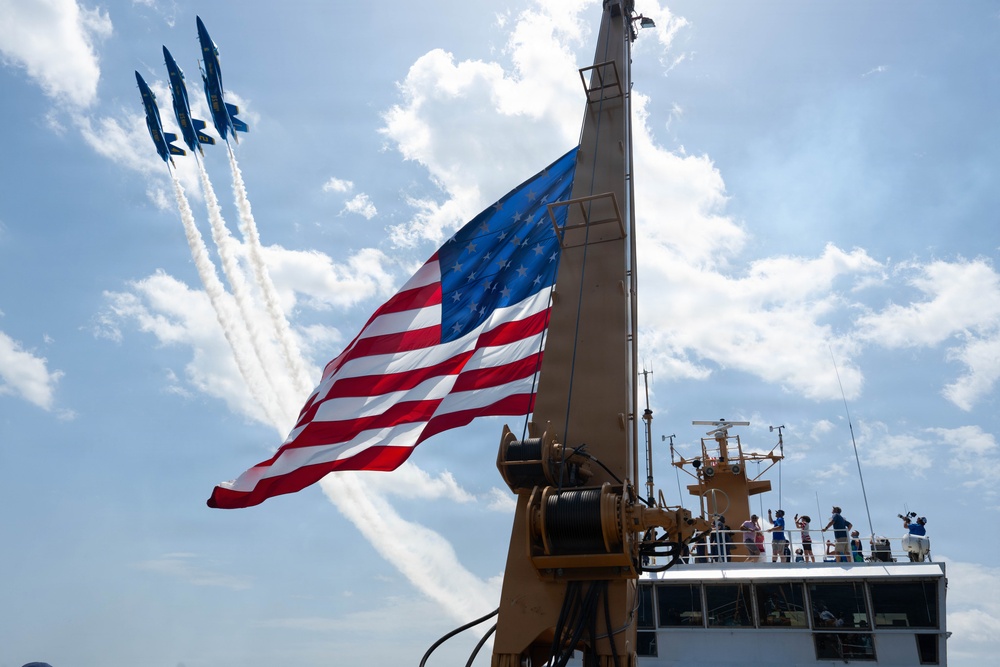 The U.S. Navy Blue Angels fly across the U.S. Coast Guard Cutter Barbara Mabrity’s national ensign