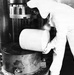 Historical Photo Radford Army Ammunition Plant employee on the production line cleaning after production