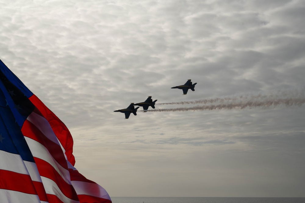 The U.S. Navy Blue Angels fly across the U.S. Coast Guard Cutter Barbara Mabrity’s national ensign