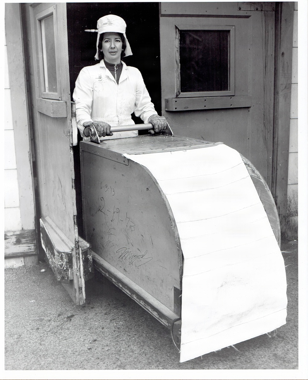Historic photo of an employee on the line blocking press at Radford Ordnance Works.