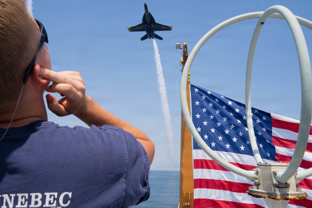 the Blue Angels fly over the U.S. Coast Guard Cutter Barbara Mabrity in Pensacola Florida