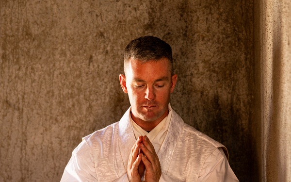U.S. Navy Lt. Peter St.George holds religious services during AFX