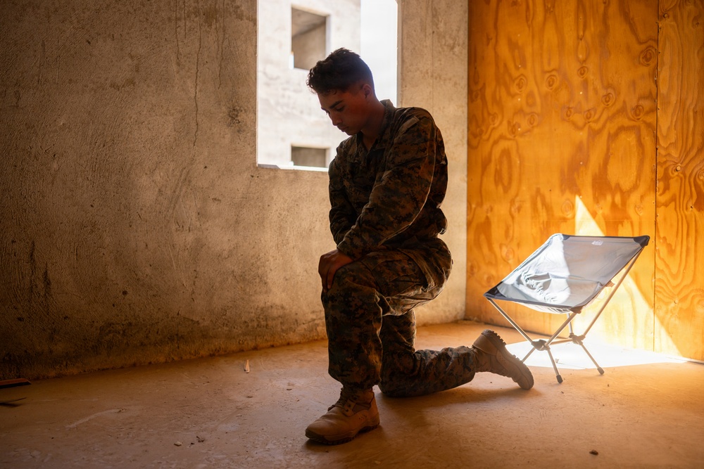 U.S. Navy Lt. Peter St.George holds religious services during AFX