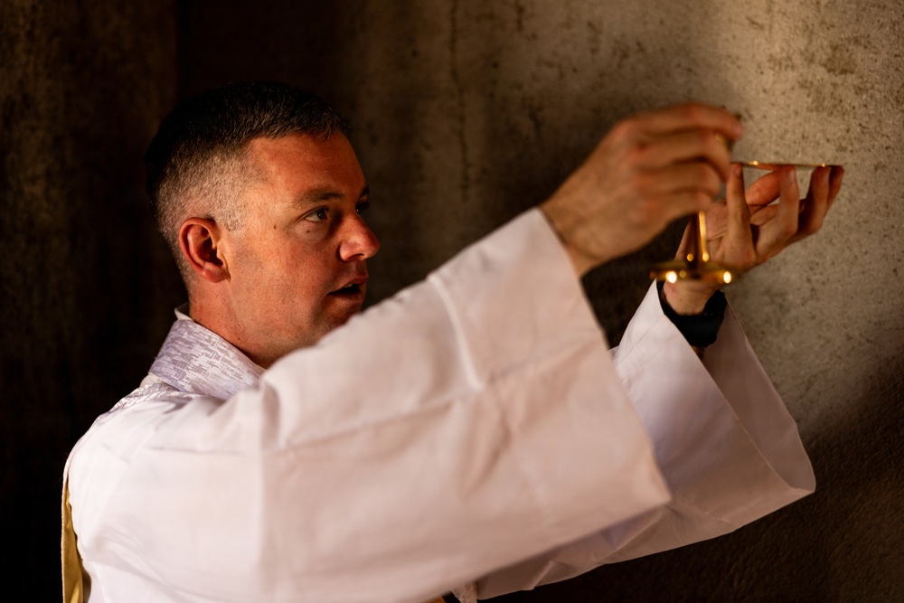 U.S. Navy Lt. Peter St.George holds religious services during AFX