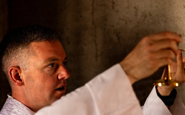U.S. Navy Lt. Peter St.George holds religious services during AFX