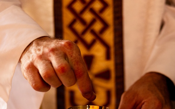 U.S. Navy Lt. Peter St.George holds religious services during AFX