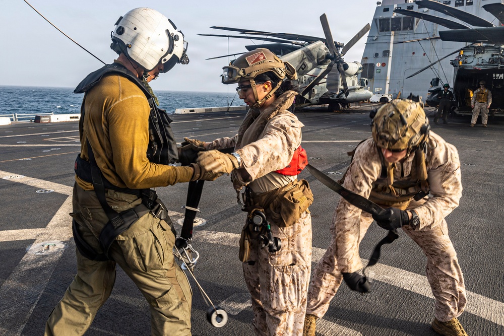 11th MEU Marines, Sailors Conduct Hoist Training Aboard USS Portland