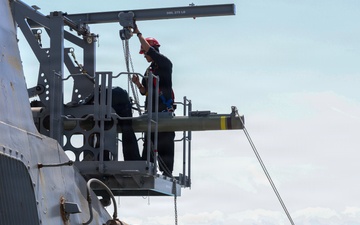 USS Oscar Austin Conducts Ammo Onload