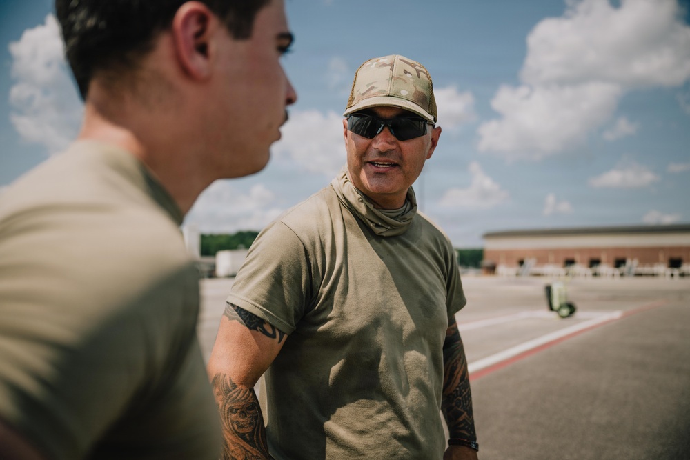 Judice briefs trainee during K-loader certification