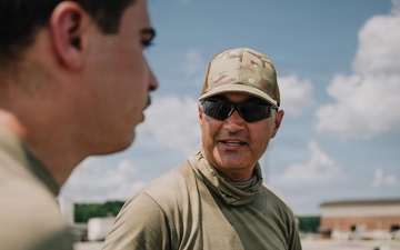 Judice briefs trainee during K-loader certification