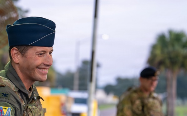 125th Fighter Wing Commander Greets Wing Members at the Gate