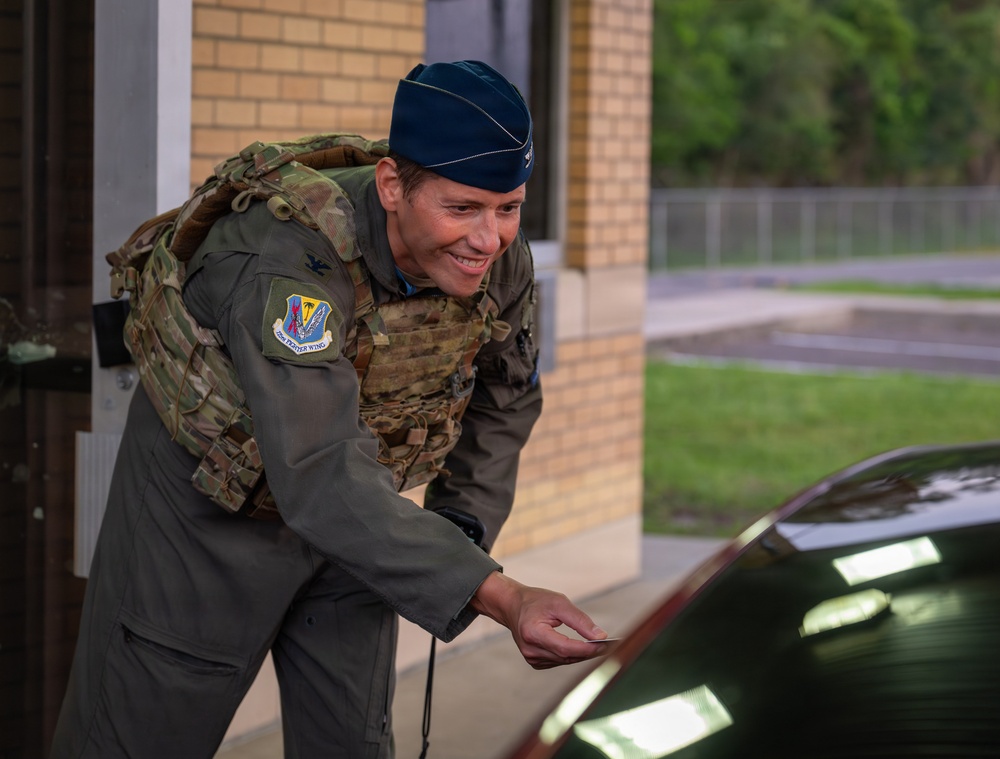 125th Fighter Wing Commander Greets Wing Members at the Gate