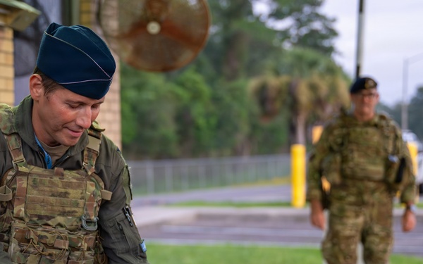 125th Fighter Wing Commander Greets Wing Members at the Gate