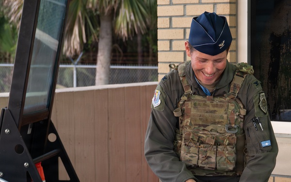 125th Fighter Wing Commander Greets Wing Members at the Gate