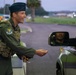 125th Fighter Wing Commander Greets Wing Members at the Gate