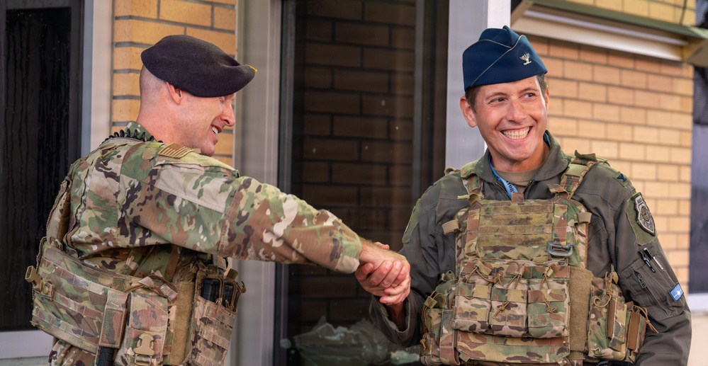 125th Fighter Wing Commander Greets Wing Members at the Gate