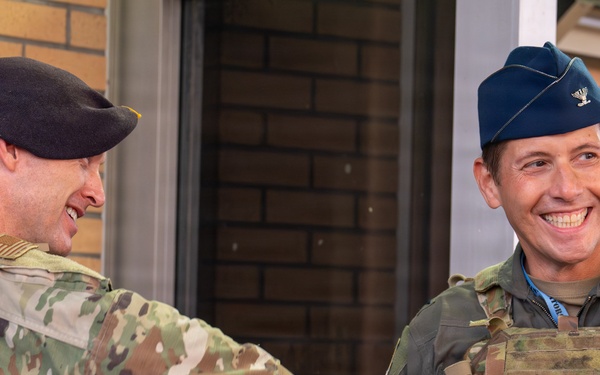 125th Fighter Wing Commander Greets Wing Members at the Gate