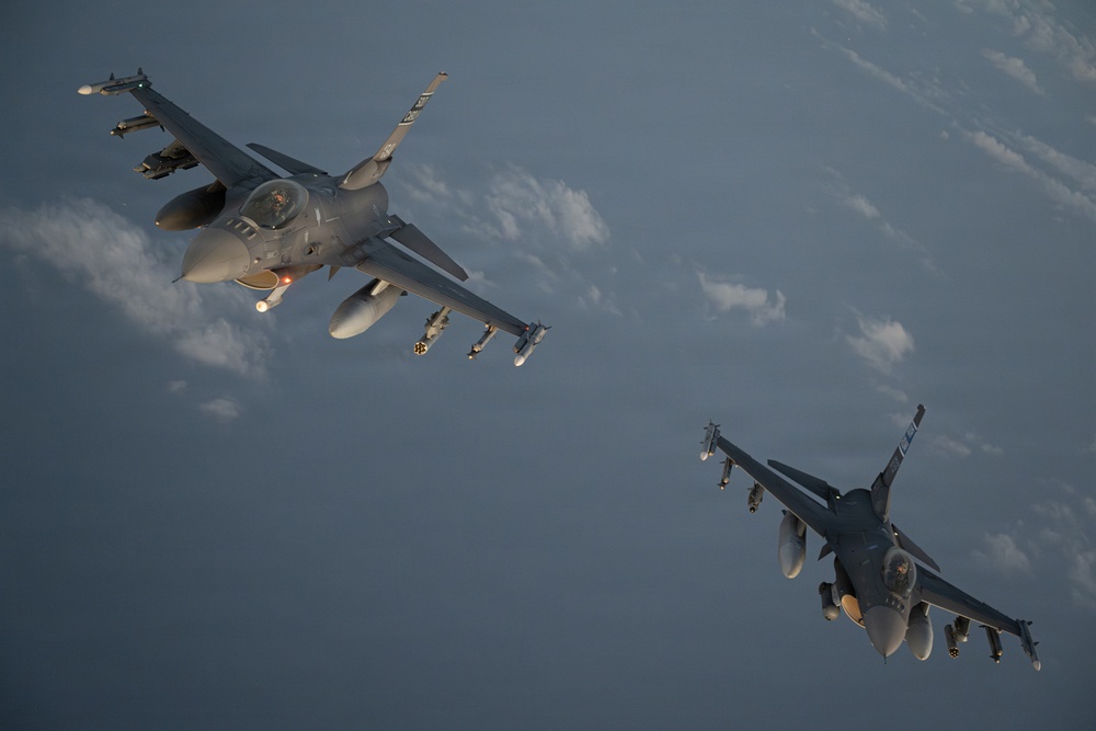 KC-135 supports F-16 refueling operation in CENTCOM