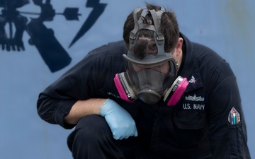 Delbert D. Black Sailors Conduct Maintenance