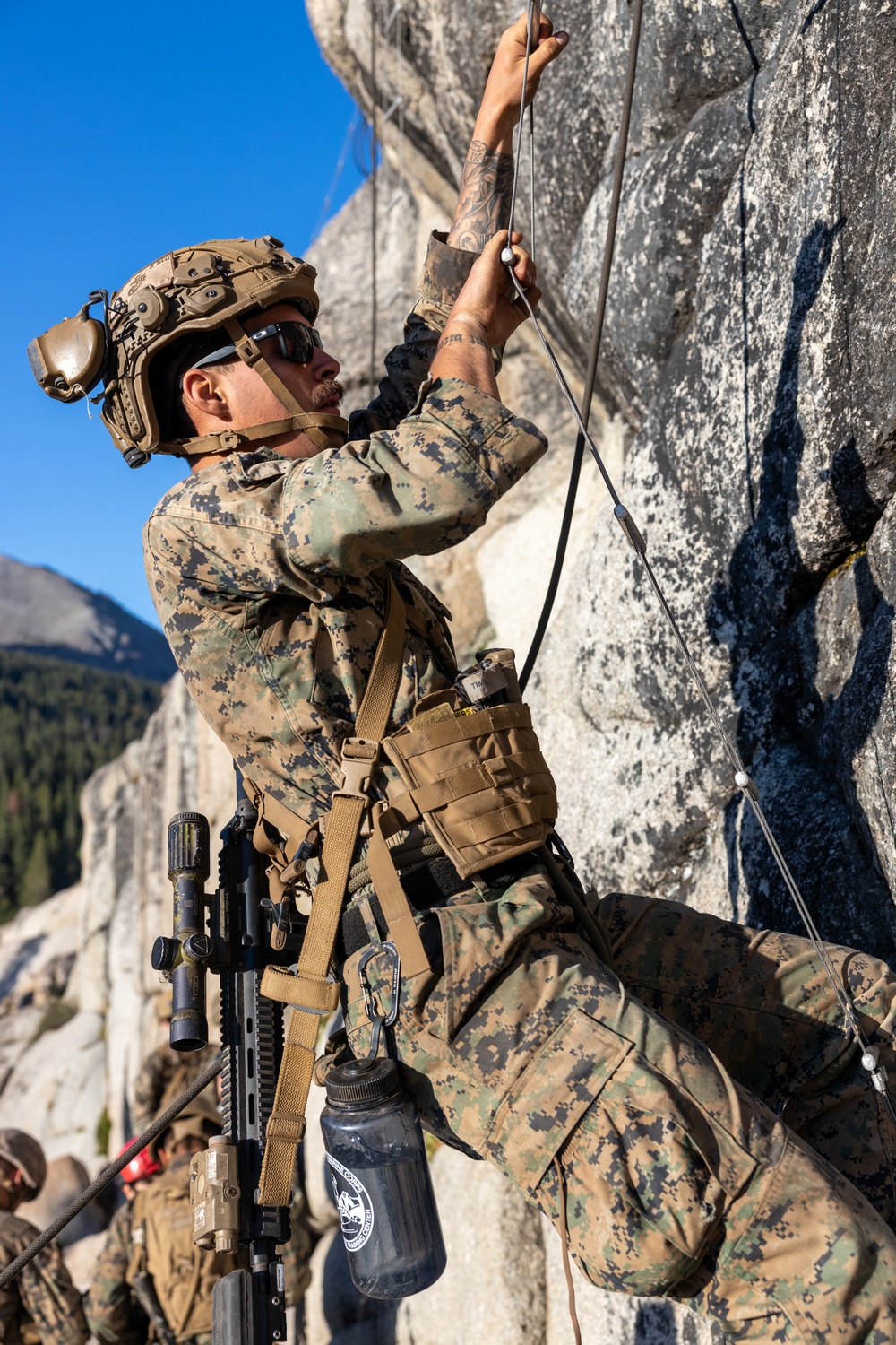 3rd Bn., 4th Marines prepare to climb cliffs during MTX 4-26