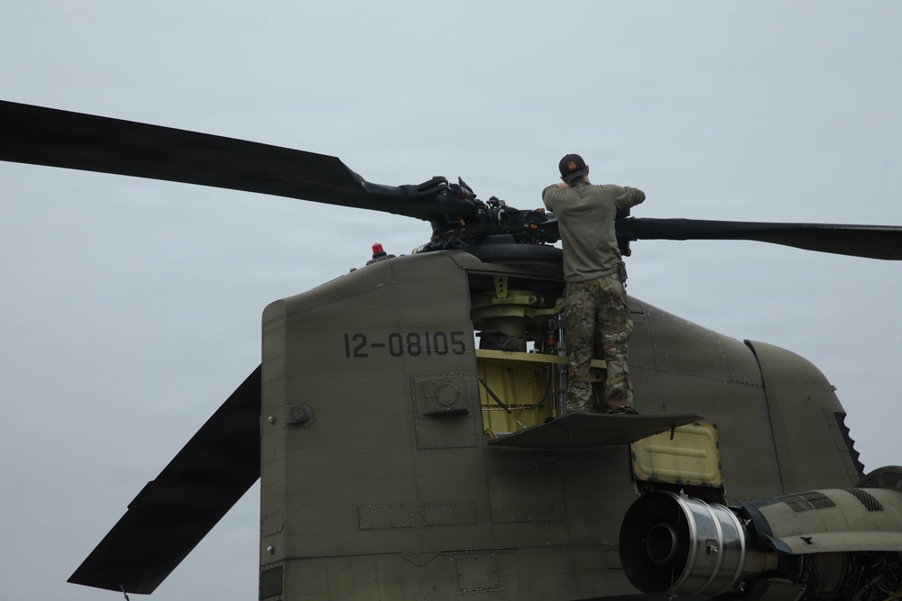Green Berets, Alaska Army National Guard air crew prepare for RAPIDS infil to Savoonga during Operation Polar Dagger.