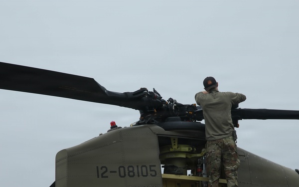 Green Berets, Alaska Army National Guard air crew prepare for RAPIDS infil to Savoonga during Operation Polar Dagger.