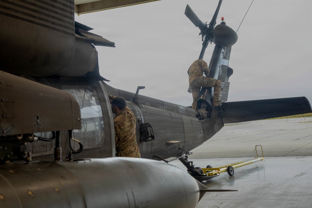 Green Berets, Alaska Army National Guard air crew prepare for RAPIDS infil to Savoonga during Operation Polar Dagger.