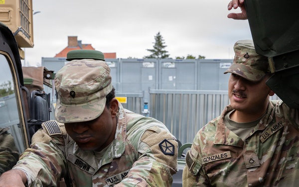 Signal Intelligence Support Company conducts preventive maintenance checks and services