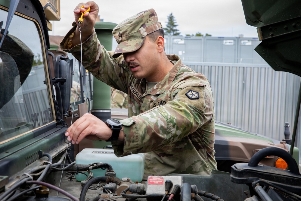 Signal Intelligence Support Company conducts preventive maintenance checks and services