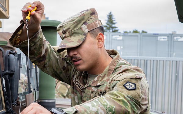 Signal Intelligence Support Company conducts preventive maintenance checks and services
