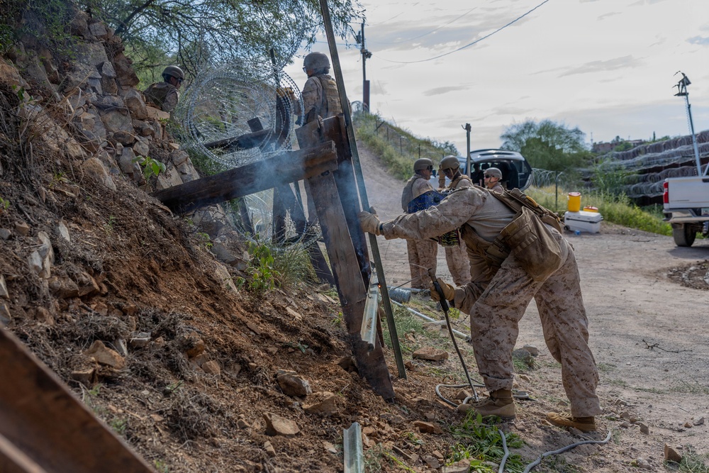 Forging Ahead: JTF-SB Marines weld and emplace fortifications along the southern border