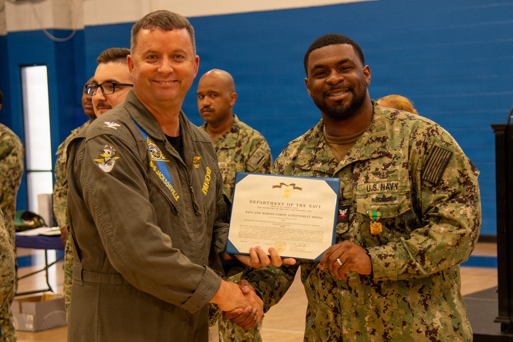 Naval Air Station Jacksonville Commanding Officer Capt. Ryan Dexter presented awards to our Sailors and civilians at Command quarters