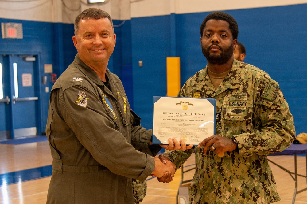 Naval Air Station Jacksonville Commanding Officer Capt. Ryan Dexter presented awards to our Sailors and civilians at Command quarters