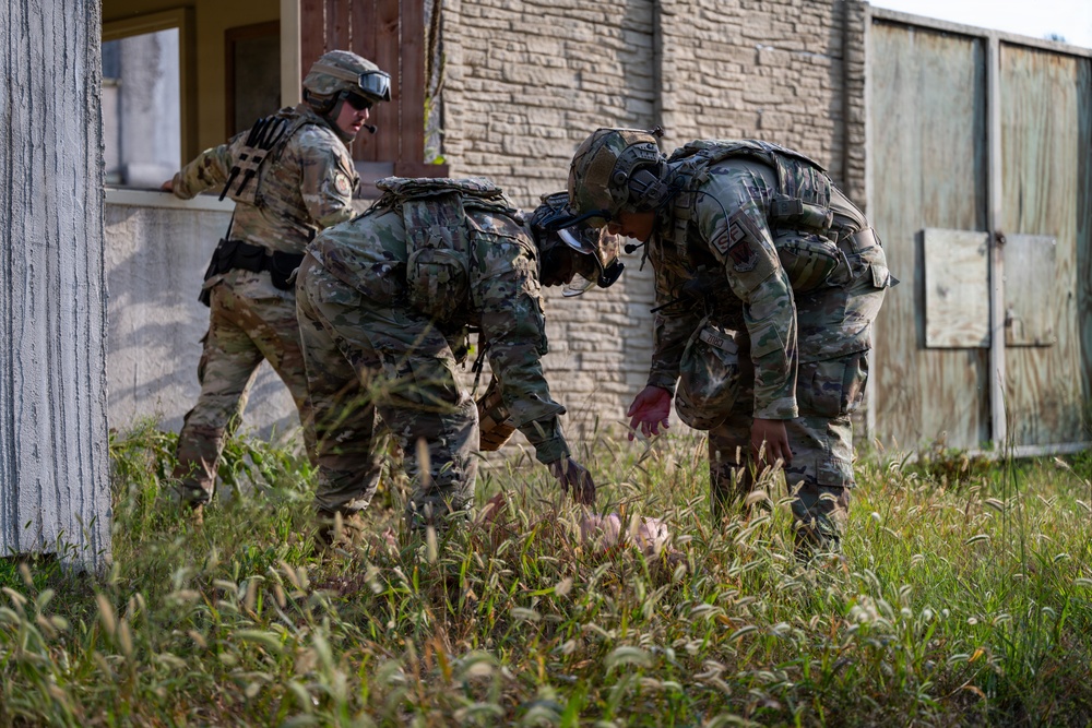 Security forces Airmen deliver life-saving tactical combat casualty care following simulated tornado during Patriot 26