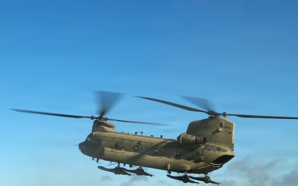 Green Berets, Alaska Army National Guard air crew prepare for RAPIDS infill to Savoonga during Operation Polar Dagger.