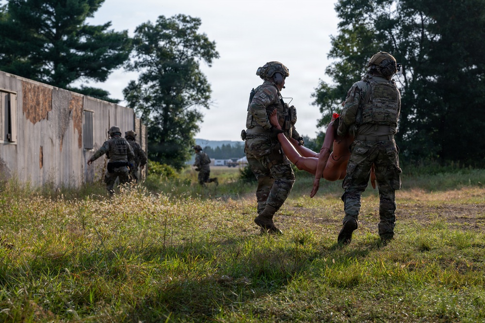 Security forces defenders deliver life-saving tactical combat casualty care following simulated tornado during Patriot 26